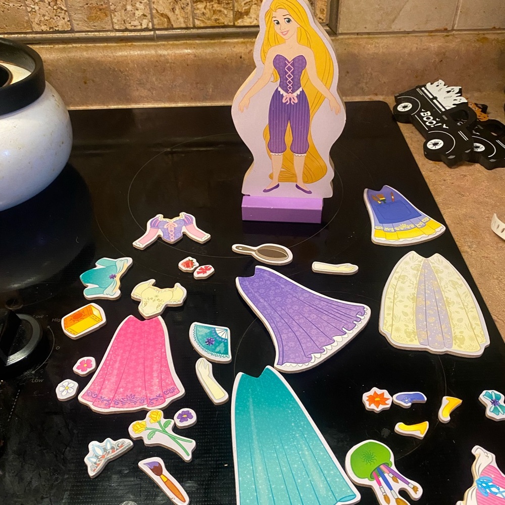 Melissa & Doug magnetic wooden doll with outfits